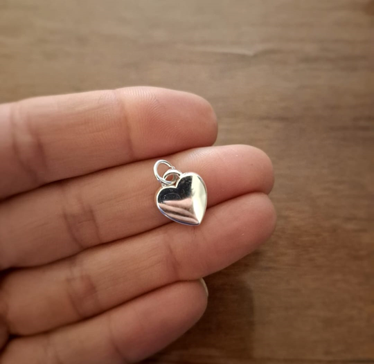 Dije mini corazón en Acero Blanco