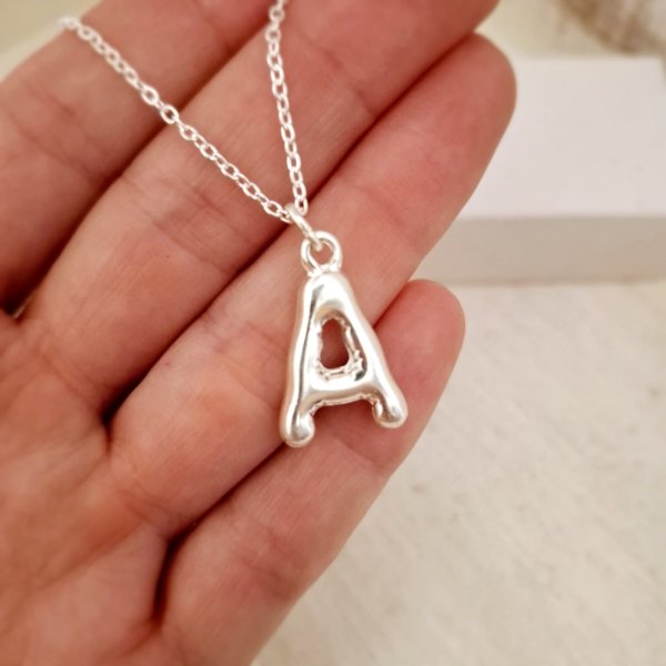 Colgante Inicial Forma Ondulada