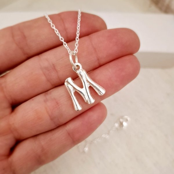 Colgante Inicial Forma Ondulada