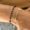 Pulsera Doble Negra más Bolitas - Acero Blanco