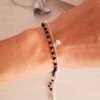 Pulsera Doble Negra más Bolitas - Acero Blanco