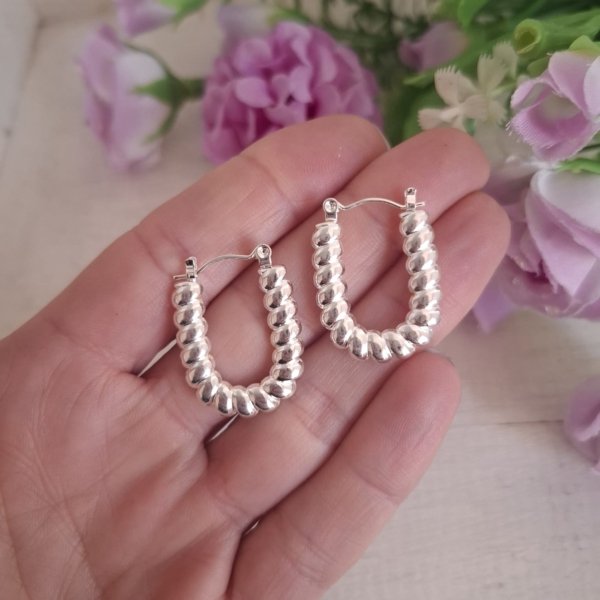 WhatsApp Image 2025-08-10 at 19.40.47 Argollas Nidina - Acero Blanco